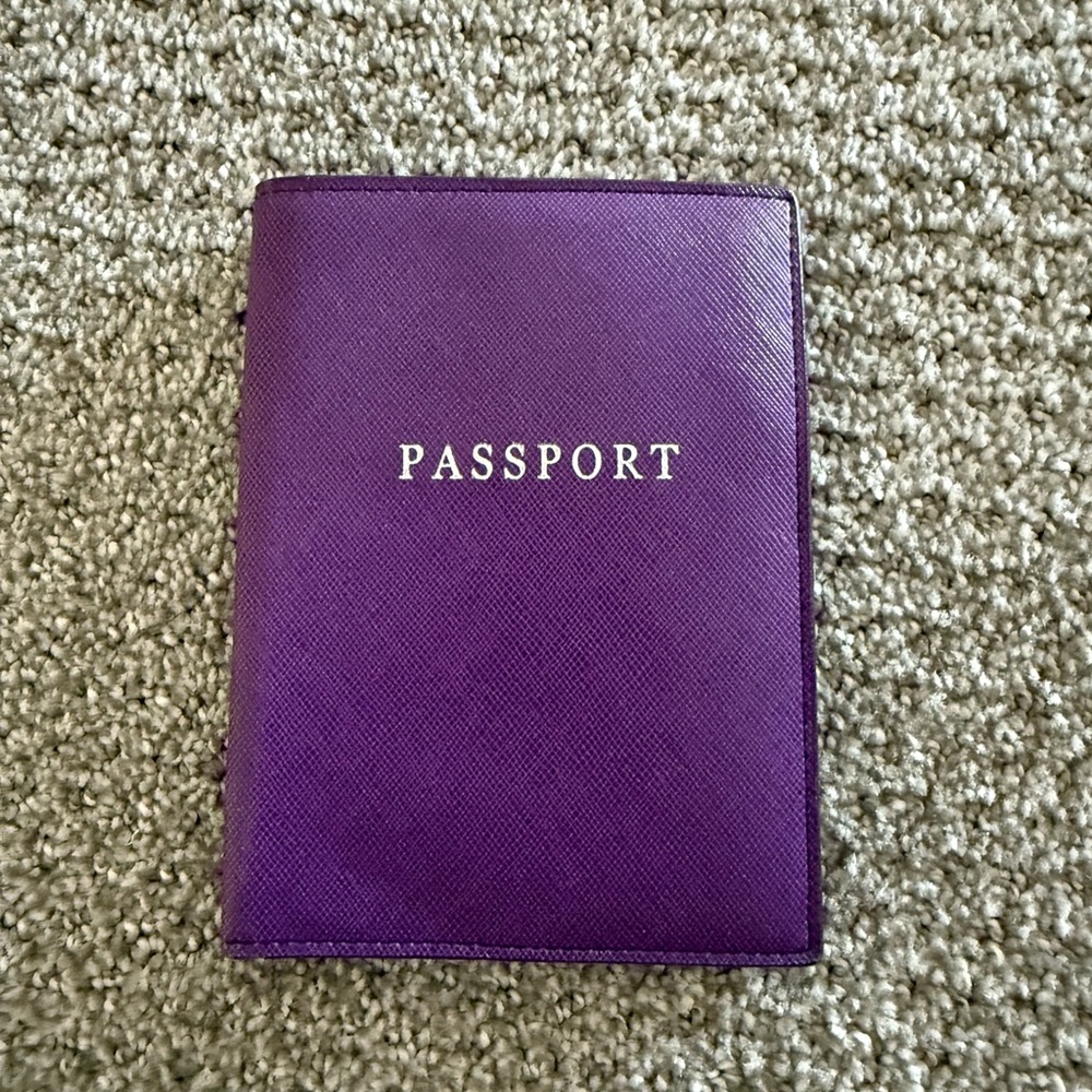 Purple passport cover